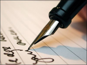 man writing a contract