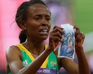 meseret_defar_of_ethiopia_wins_gold_in_the_womens_5000m_final_credit_alexander_hassenstein_getty_images_sport_getty_images_cna_us_catholic_news_8_10_12