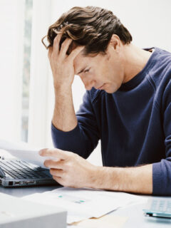 54eba8c280d18_-_nervous-man-paying-bills-xl
