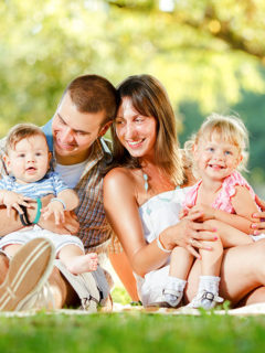 Happy family enjoying in the park